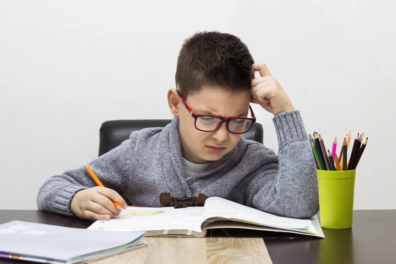 Child engaged in a structured attention activity.
